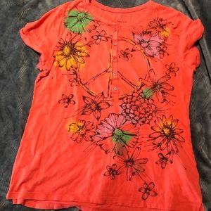 Orange Top with a Peace Sign Design